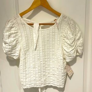 Brand New With Tags! Free People. Size M. Tie back Top. Open Back.